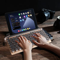 Vintage-Inspired Typewriter Keyboard with Modern Bluetooth Connectivity