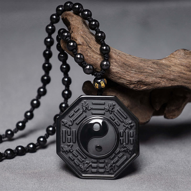 Halskette mit Yin-Yang-Anhänger aus schwarzem Obsidian