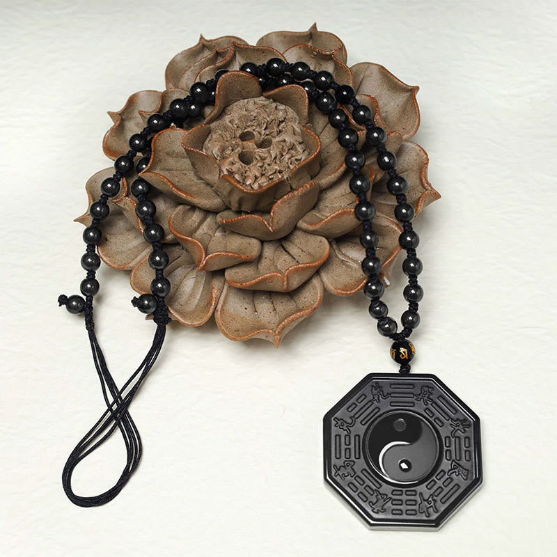 Halskette mit Yin-Yang-Anhänger aus schwarzem Obsidian