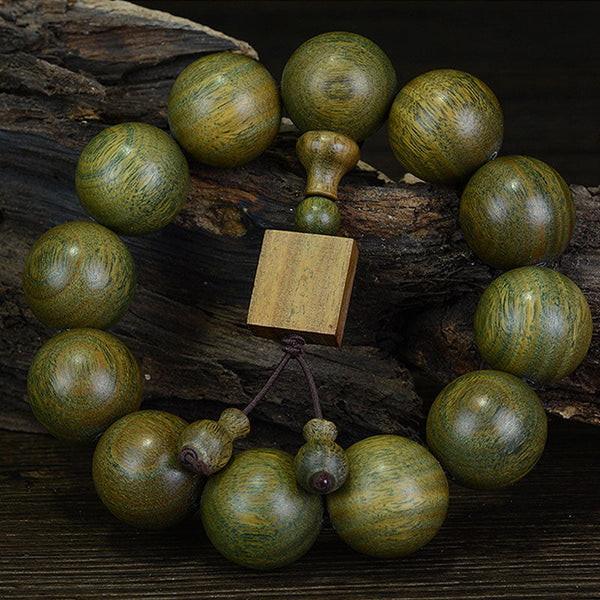 Buddha Stones Tibetisches Heilarmband aus grünem Sandelholz
