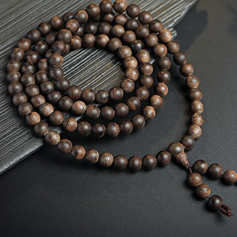Armband „Buddha Stones“ aus 108 Mala-Perlen aus Adlerholz, Frieden, Stärke, Ruhe