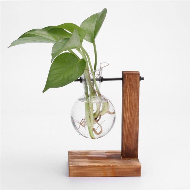 Handgefertigte Anzuchtvase aus Glas mit vertikalem Holzständer