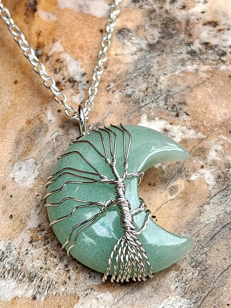 Halskette mit Anhänger aus natürlichem Bergkristall mit Mond und Lebensbaum